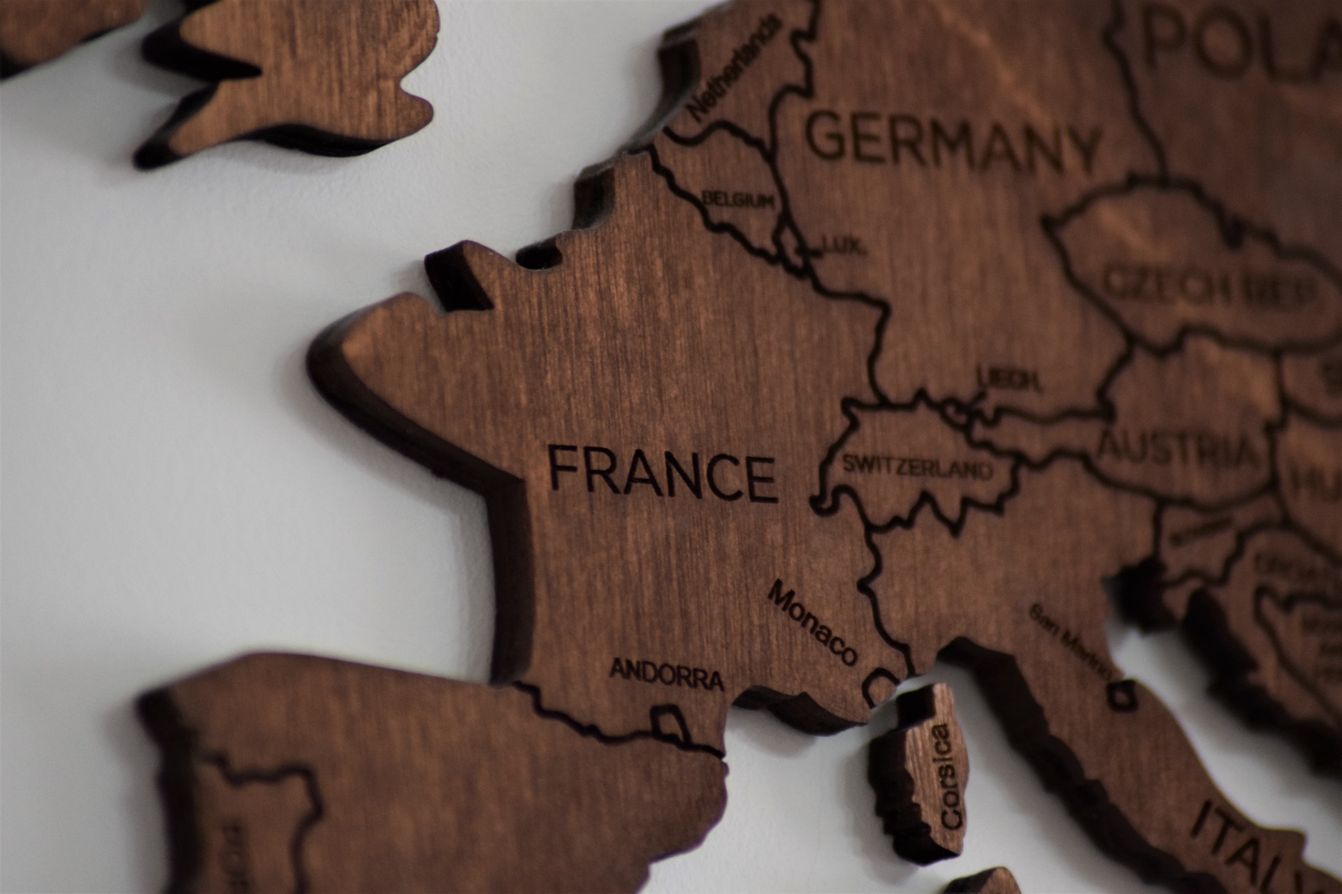 /close-up-photo-of-wooden-jigsaw-map